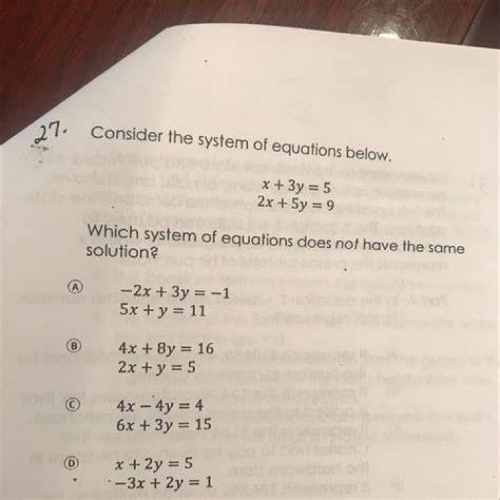 Which system of equations does not have the same solution