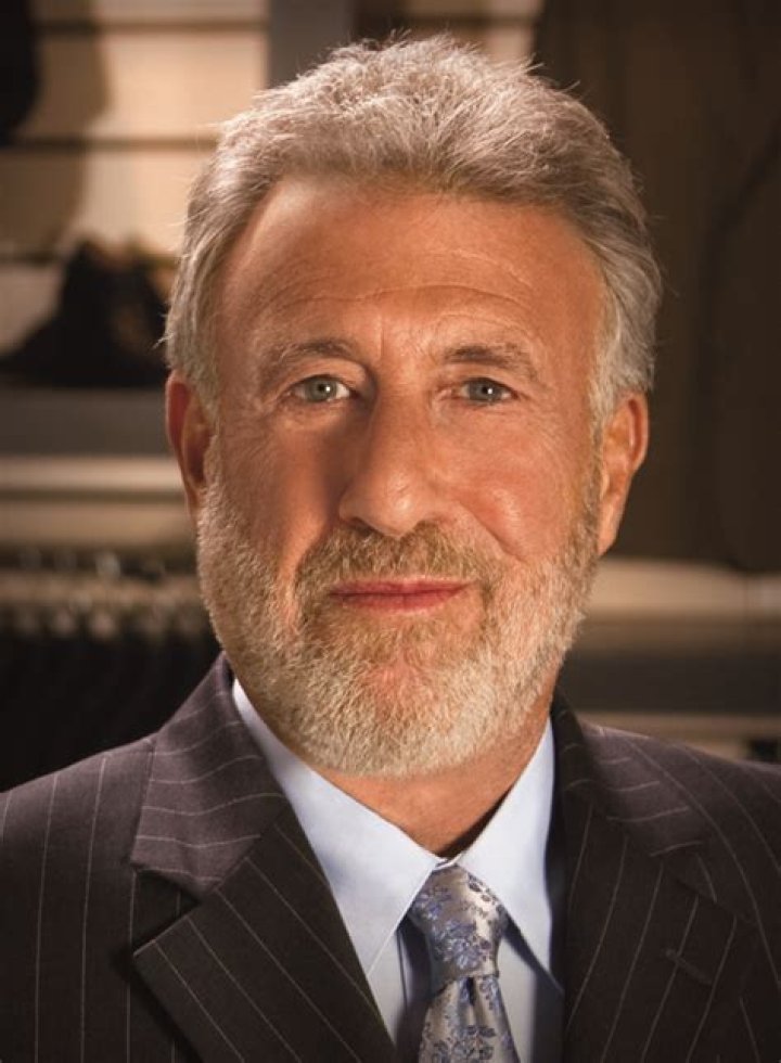 Why did George Zimmer get fired from Mens Wearhouse