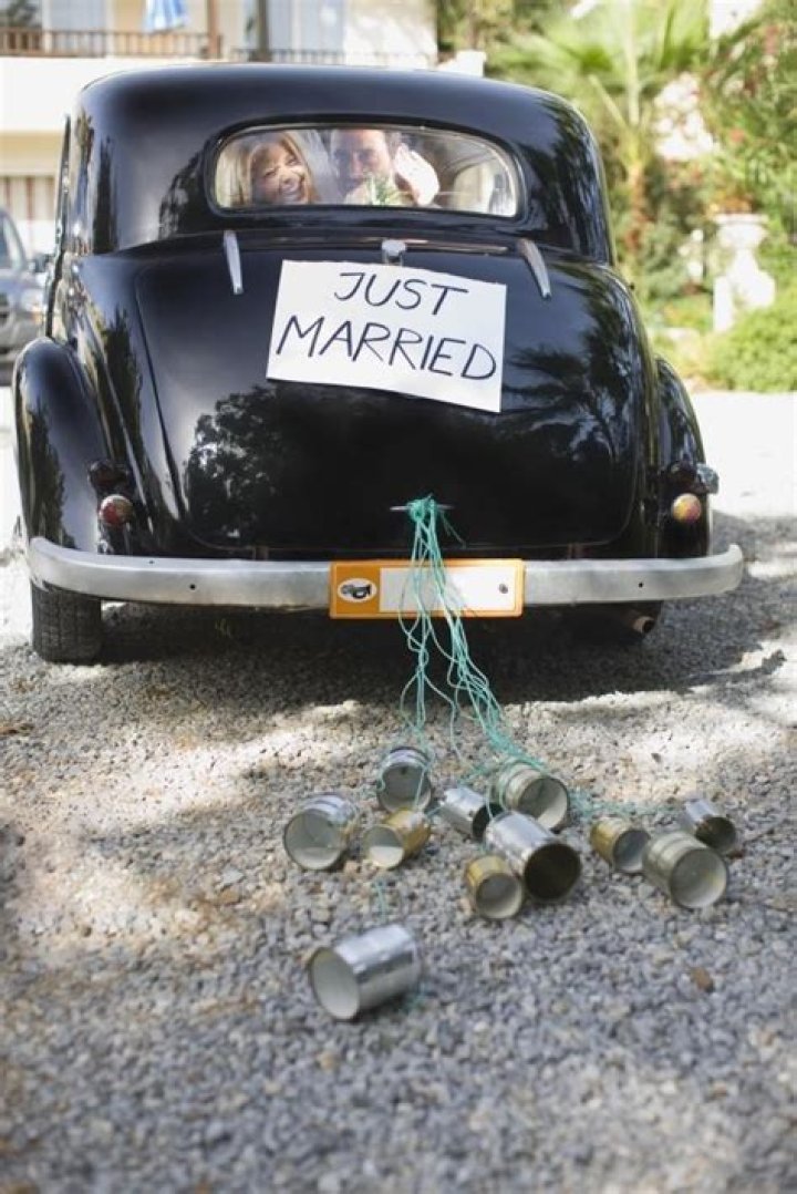 Why do people put tin cans on wedding cars